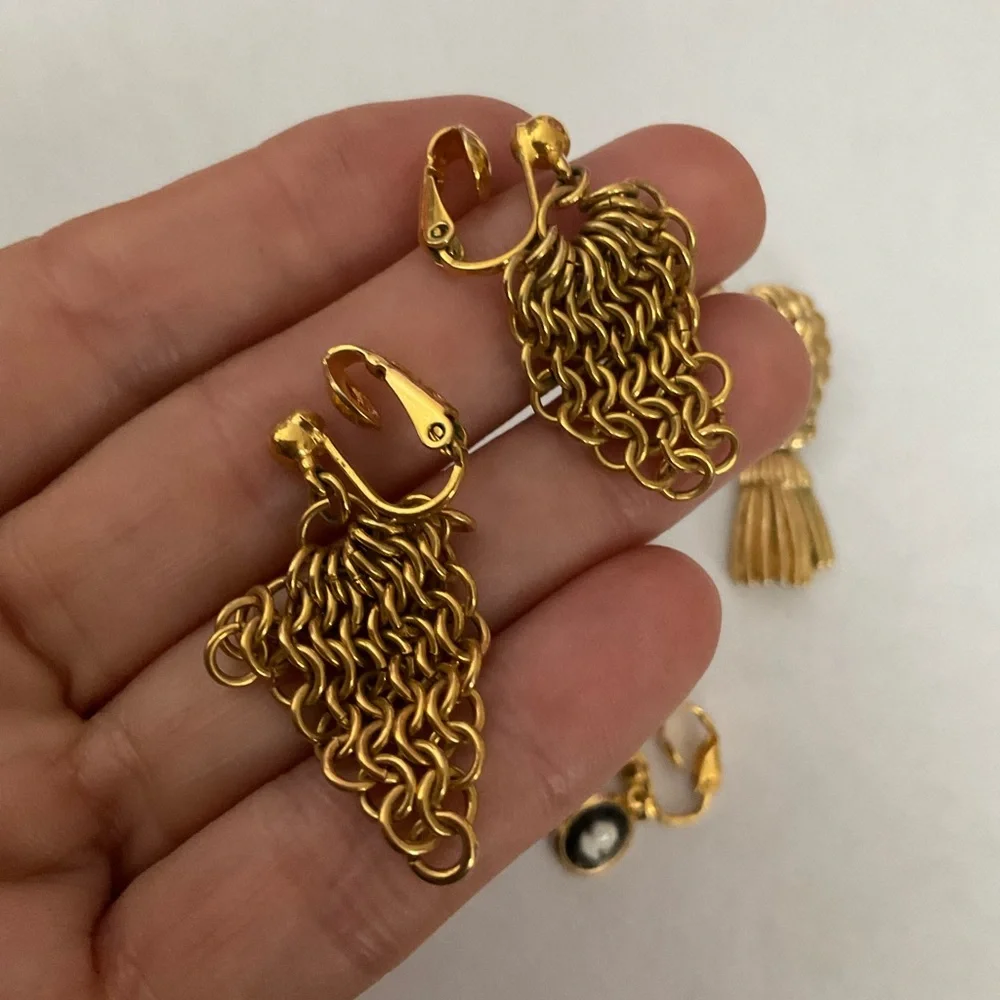 FOUR PAIRS OF‎ VINTAGE GOLD TONE CLIP ON EARRINGS